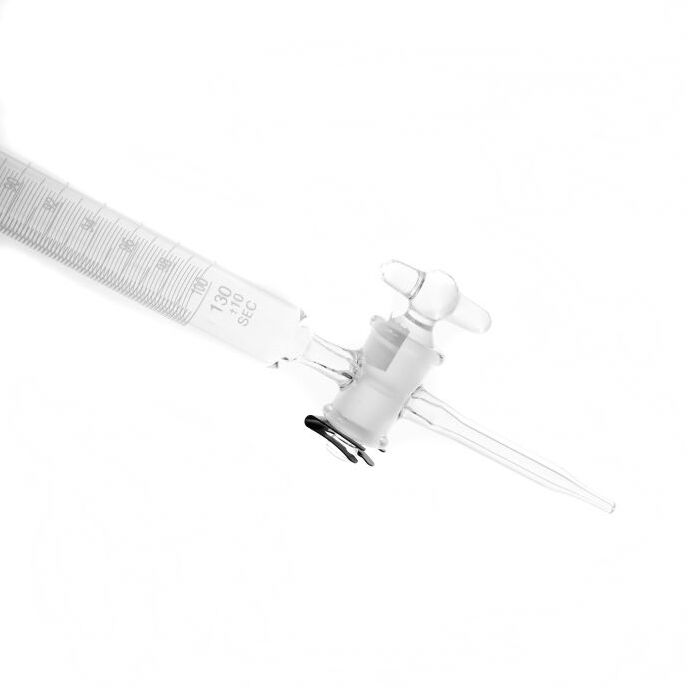 Bureta graduada con llave de vidrio línea blanca.